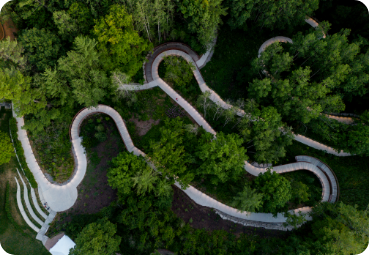 guidelines-page An areal view of a winding walkway and some trees